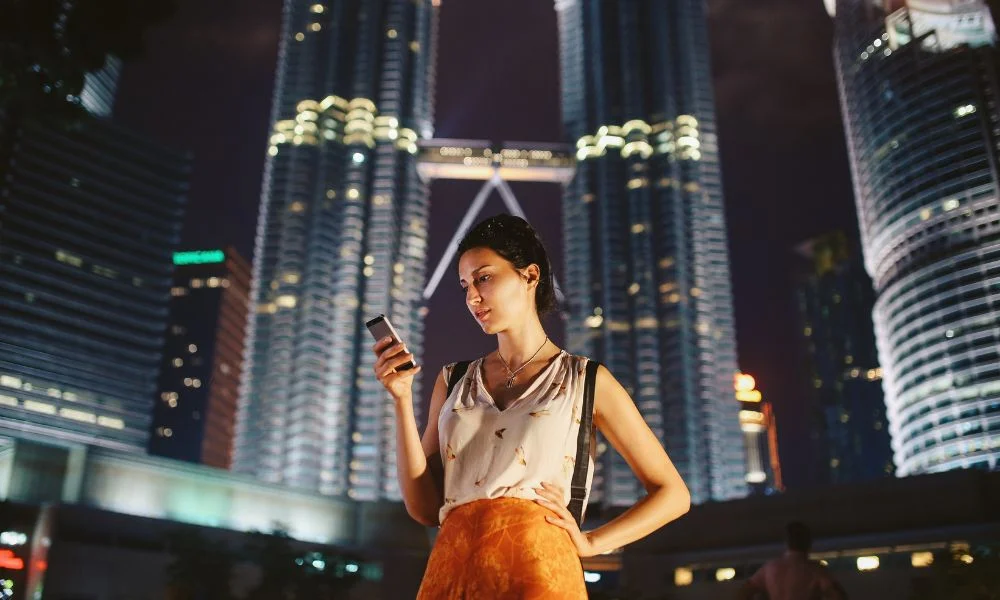 Tourist Navigating the City of Kuala Lumpur